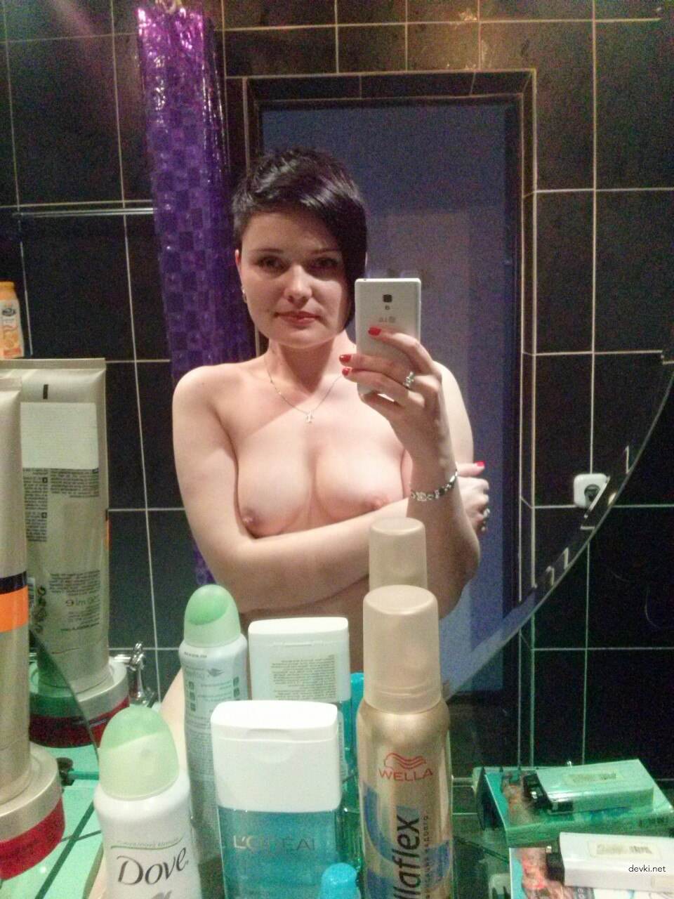 Explicit Nude Woman with Short Hair - Sensual Adult Content