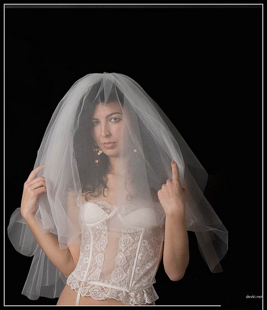 Sensual Bride in Erotic Photoshoot: Seductive Wedding Lingerie Exposed