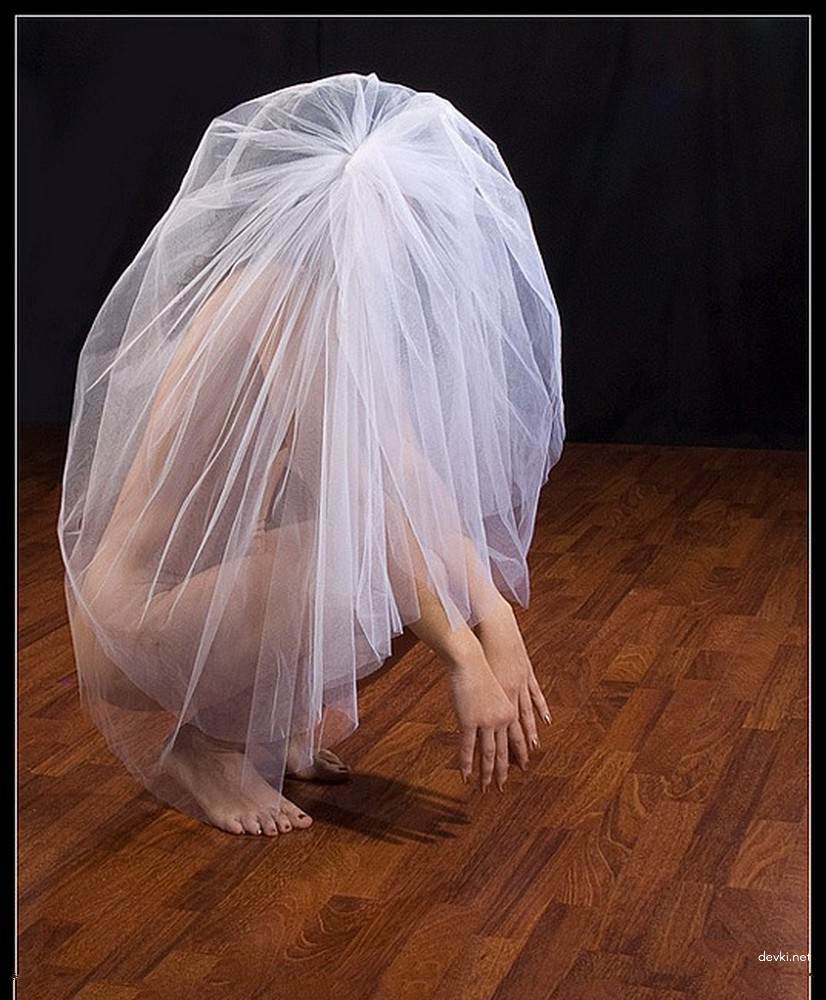 Sensual Bride in Erotic Photoshoot: Seductive Wedding Lingerie Exposed