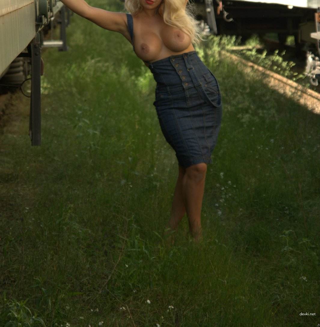 Blonde Bombshell with Impressive Cleavage - Busty Beauty in Full Display