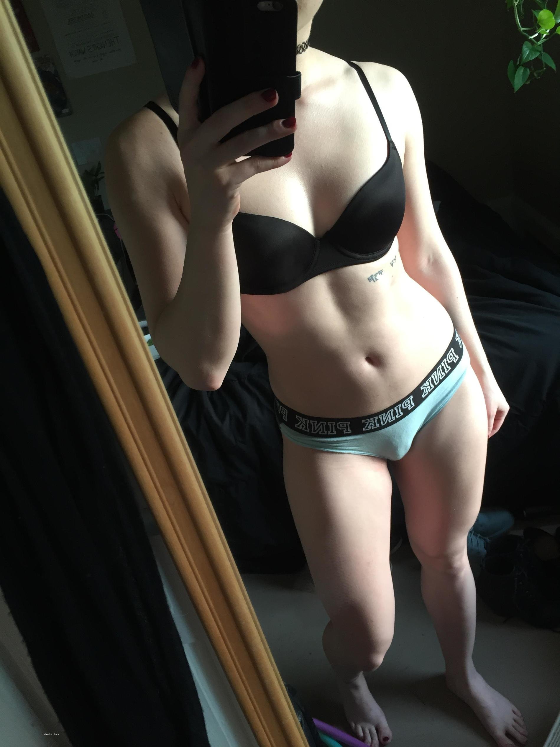 Sexy Athletic Girl in Provocative Pose: Fitness and Seduction