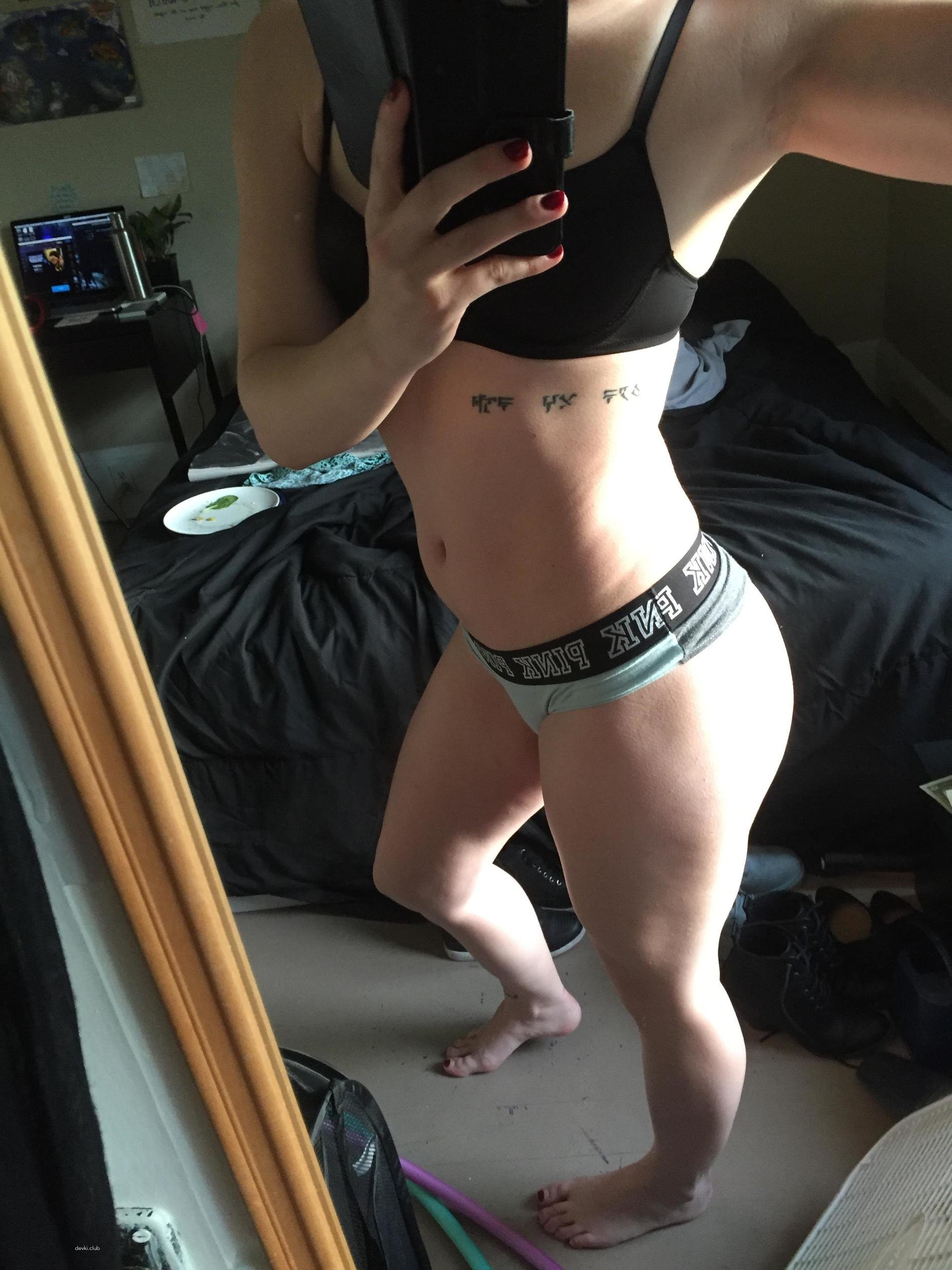 Sexy Athletic Girl in Provocative Pose: Fitness and Seduction