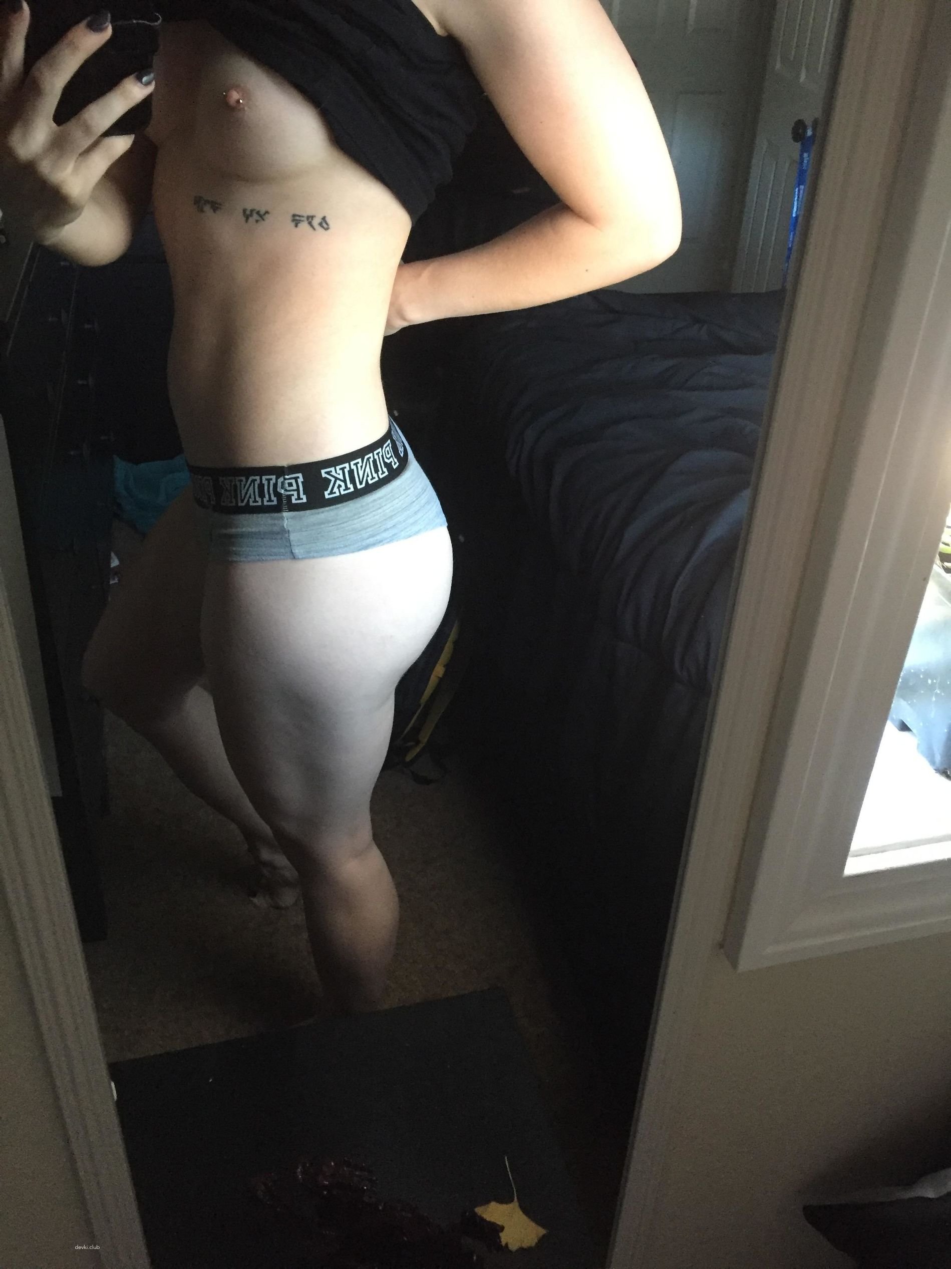 Sexy Athletic Girl in Provocative Pose: Fitness and Seduction