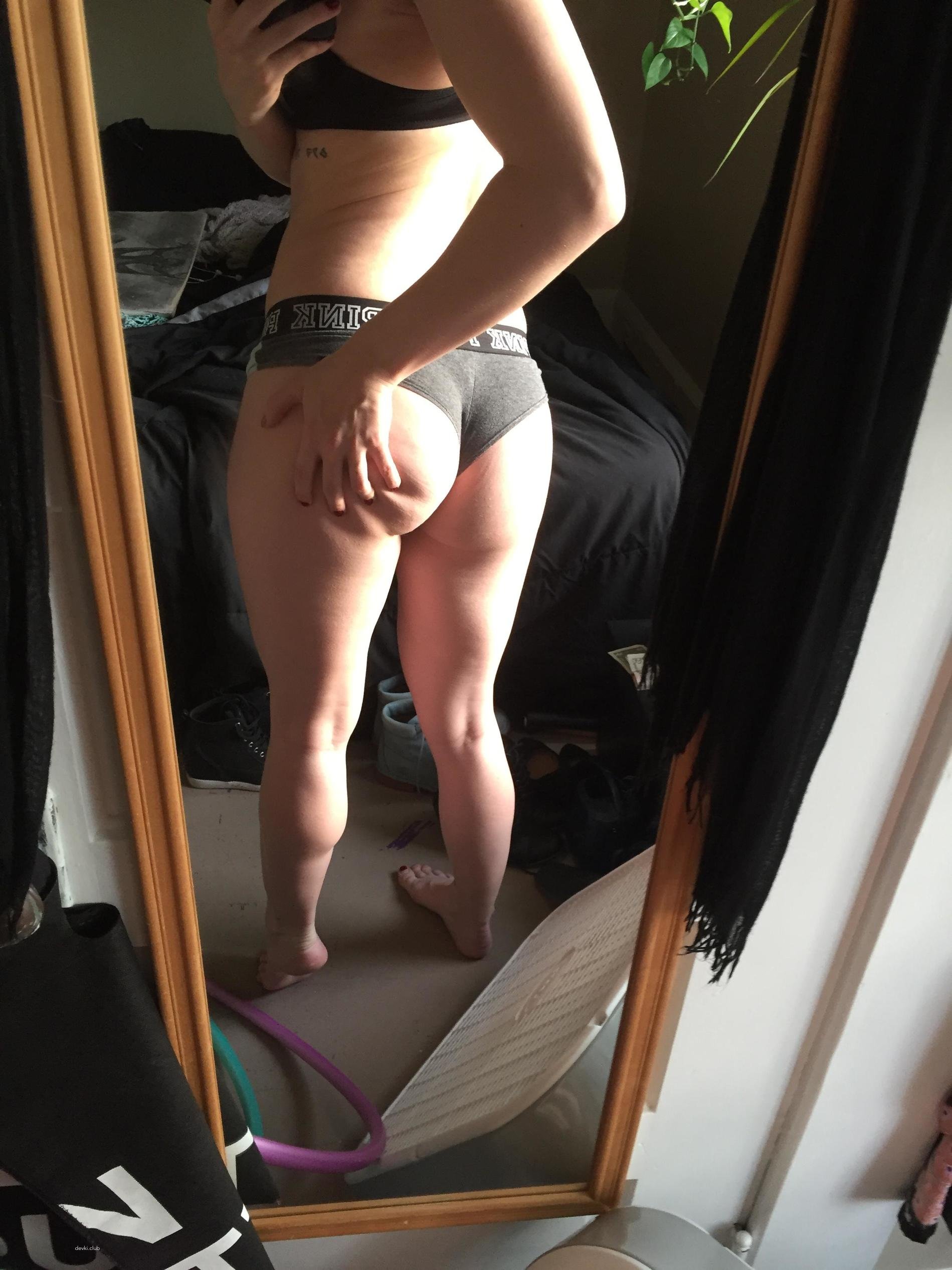 Sexy Athletic Girl in Provocative Pose: Fitness and Seduction