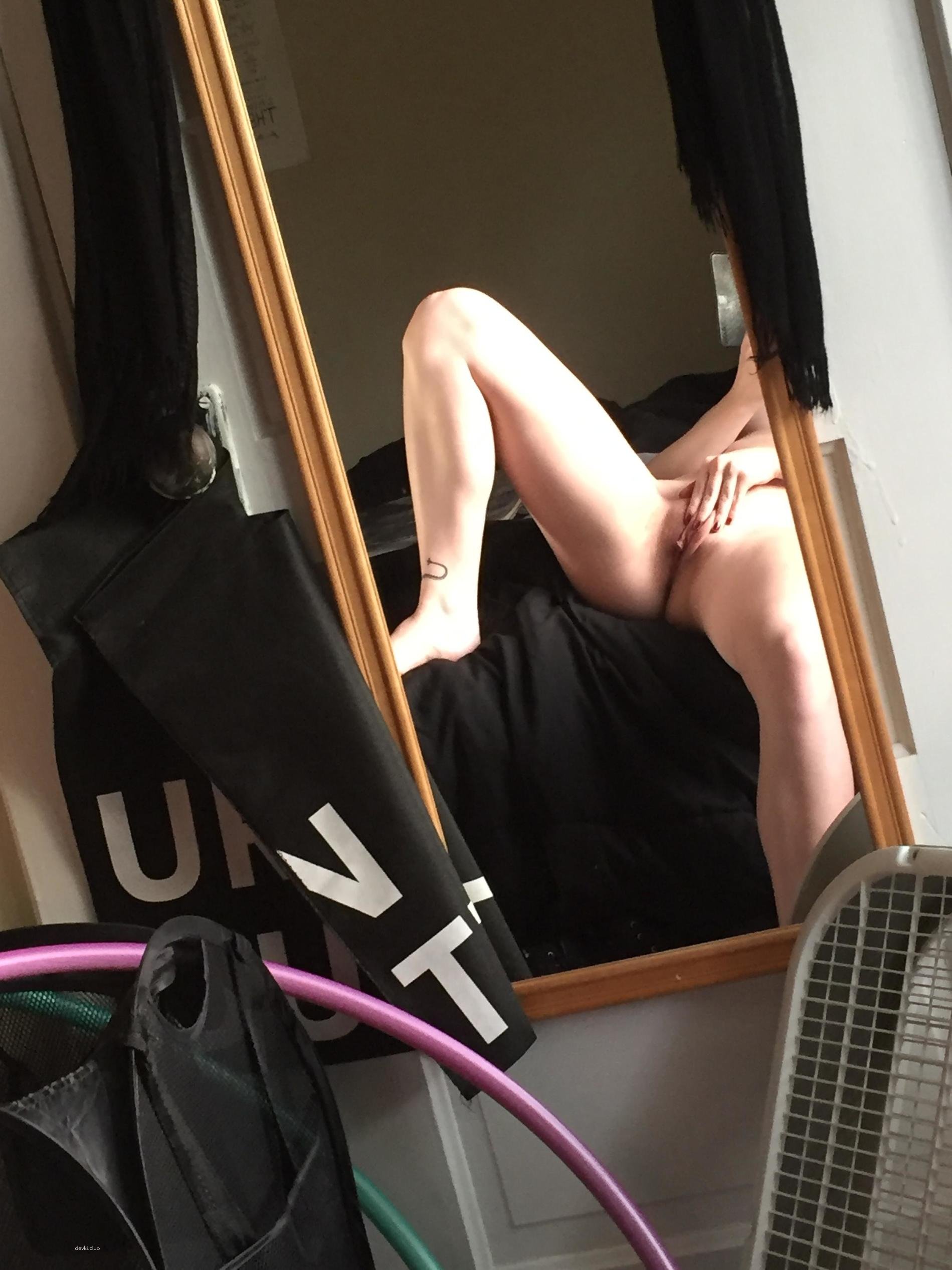 Sexy Athletic Girl in Provocative Pose: Fitness and Seduction