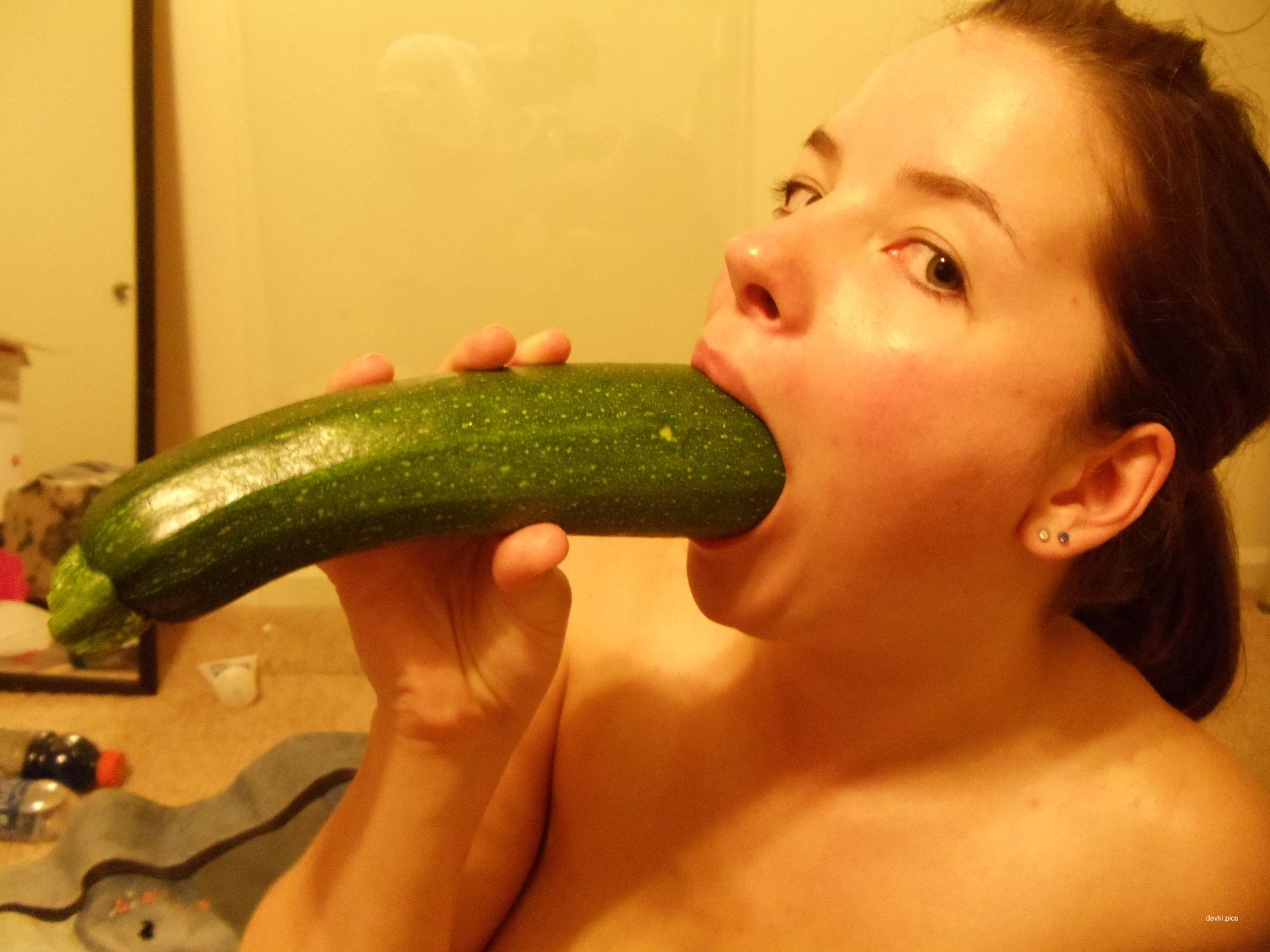 Busty babe masturbates with vegetables in explicit solo session