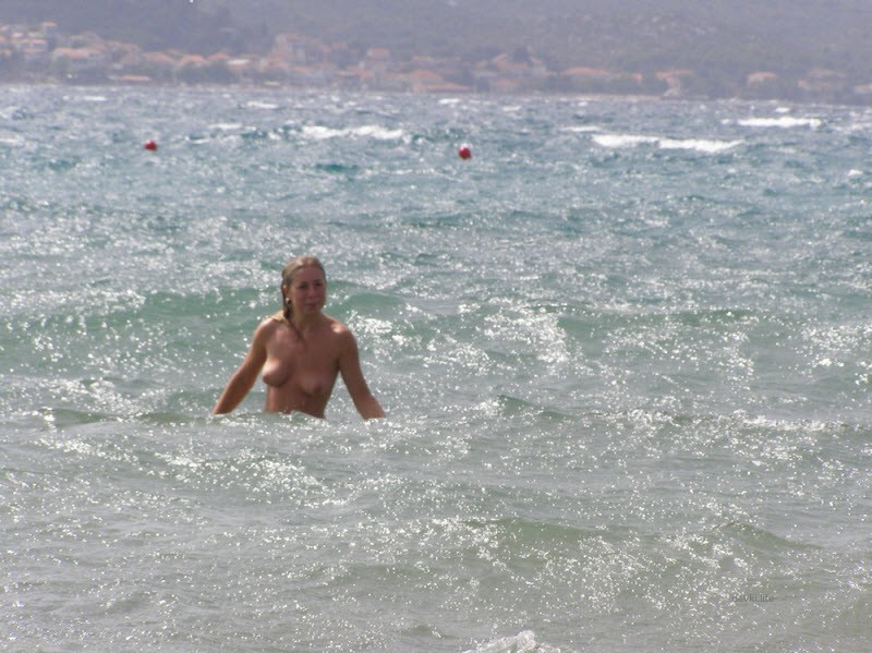 Explicit Nude Beach Relaxation with Beautiful Nudists