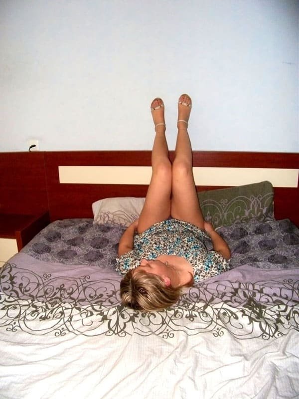 Russian Housewife Poses Boldly in Explicit Photoshoot