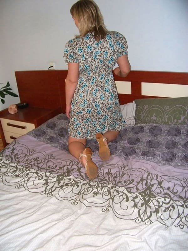 Russian Housewife Poses Boldly in Explicit Photoshoot