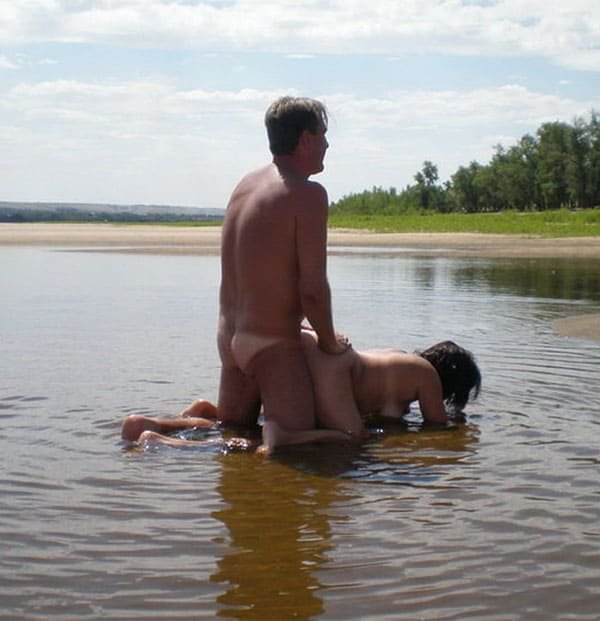 Mature Nudist Couple's Explicit Water Sex Session