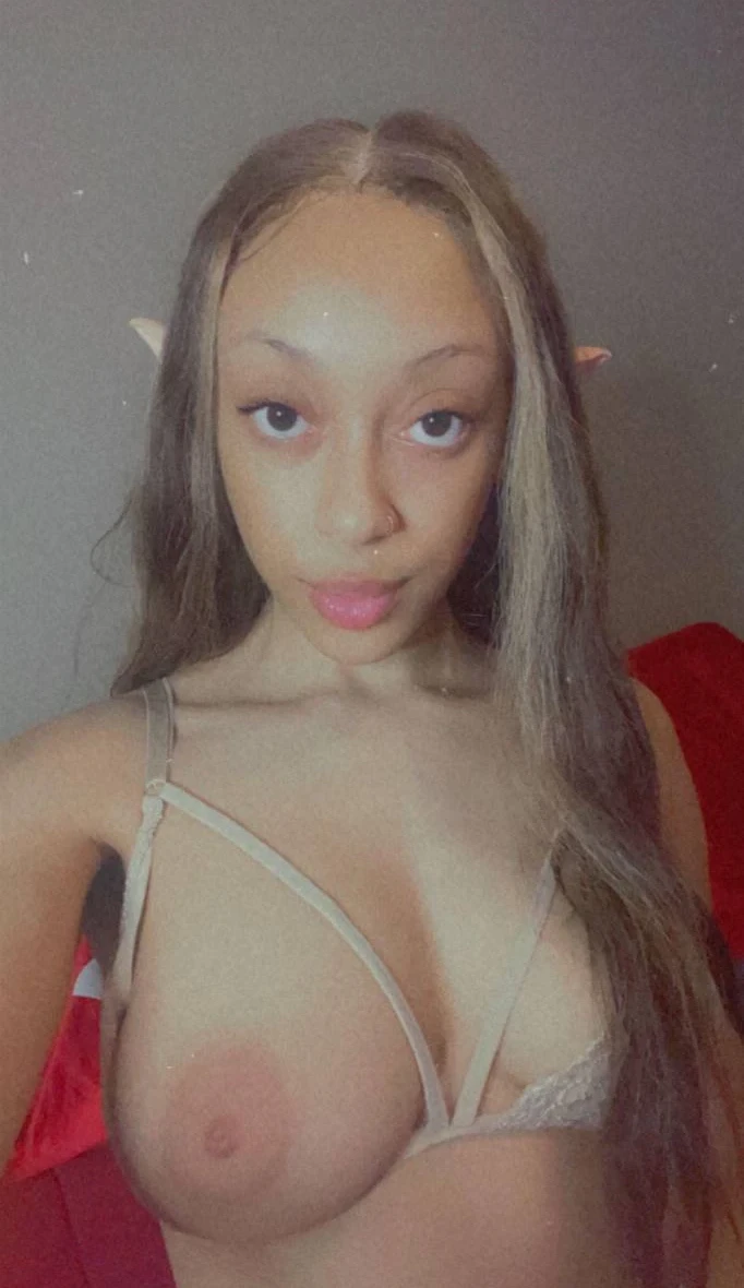 Curvaceous Ebony Babe Shows Off Her Assets in Skimpy Outfit