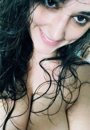 Voluptuous Beauty with Jaw-Dropping Cleavage