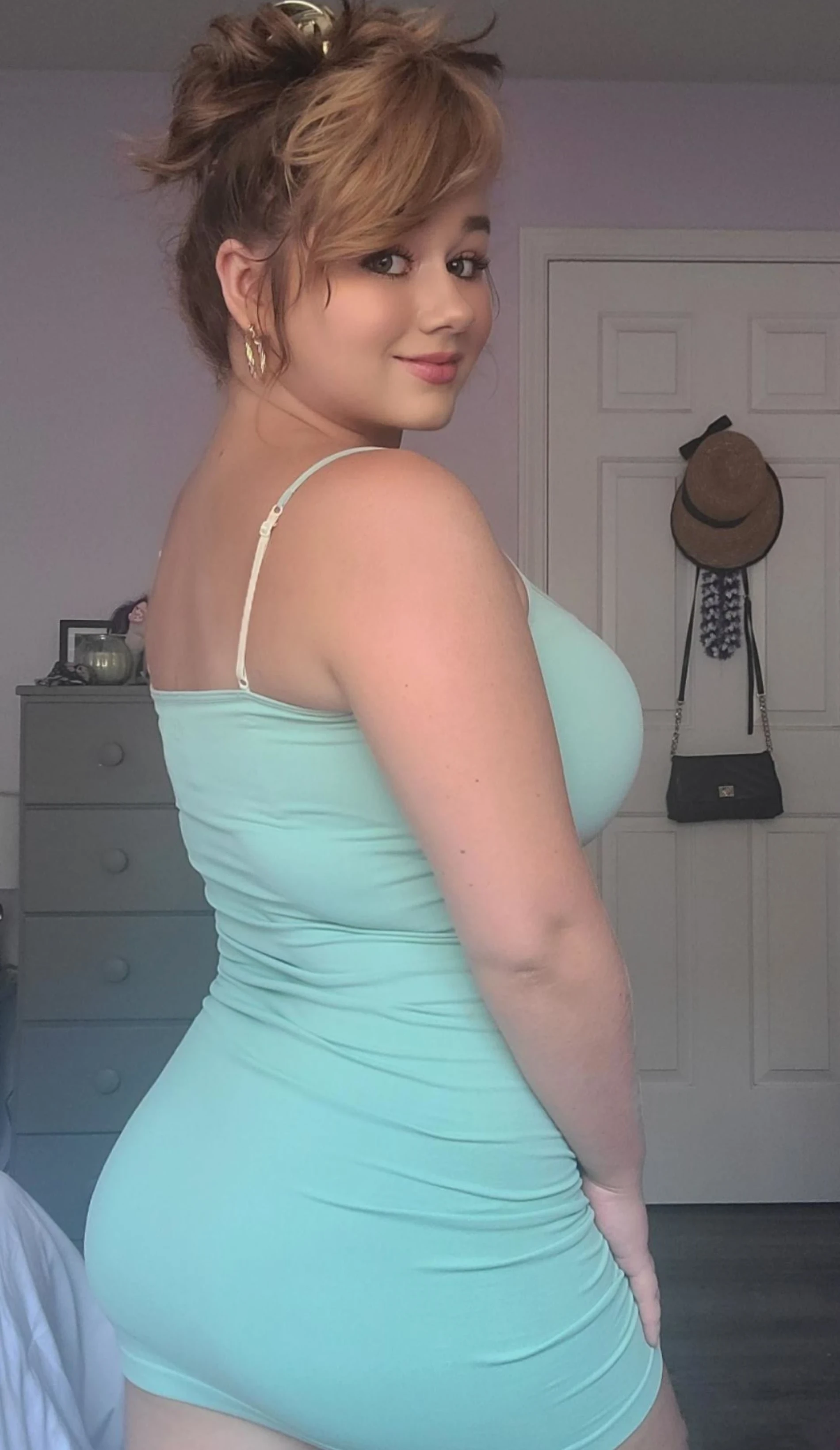 Hot Busty Blonde Teen - Seductive Curves and Plump Breasts Exposed