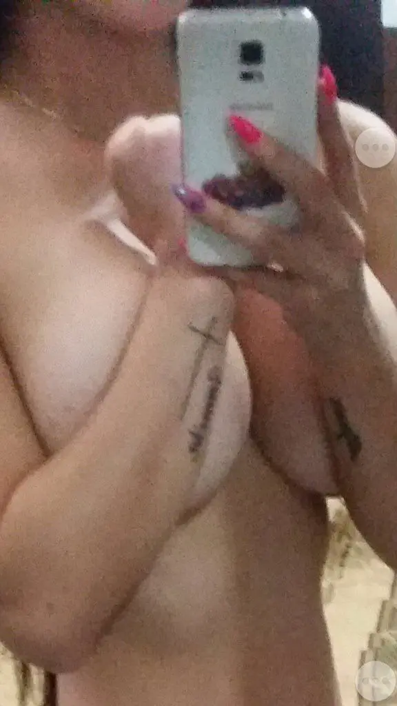 Sultry Woman with Stunning Figure Poses in Bikini: Hot and Curvy Beach Babe