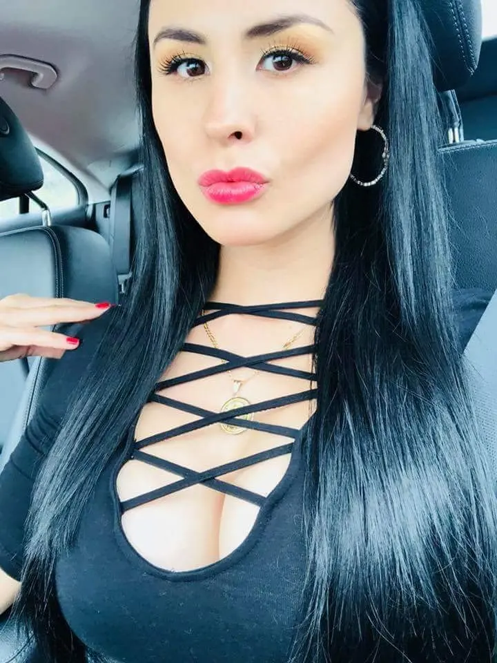 Sultry Woman with Stunning Figure Poses in Bikini: Hot and Curvy Beach Babe