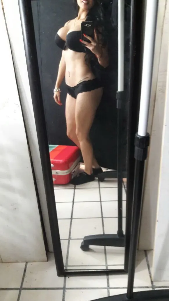 Sultry Woman with Stunning Figure Poses in Bikini: Hot and Curvy Beach Babe