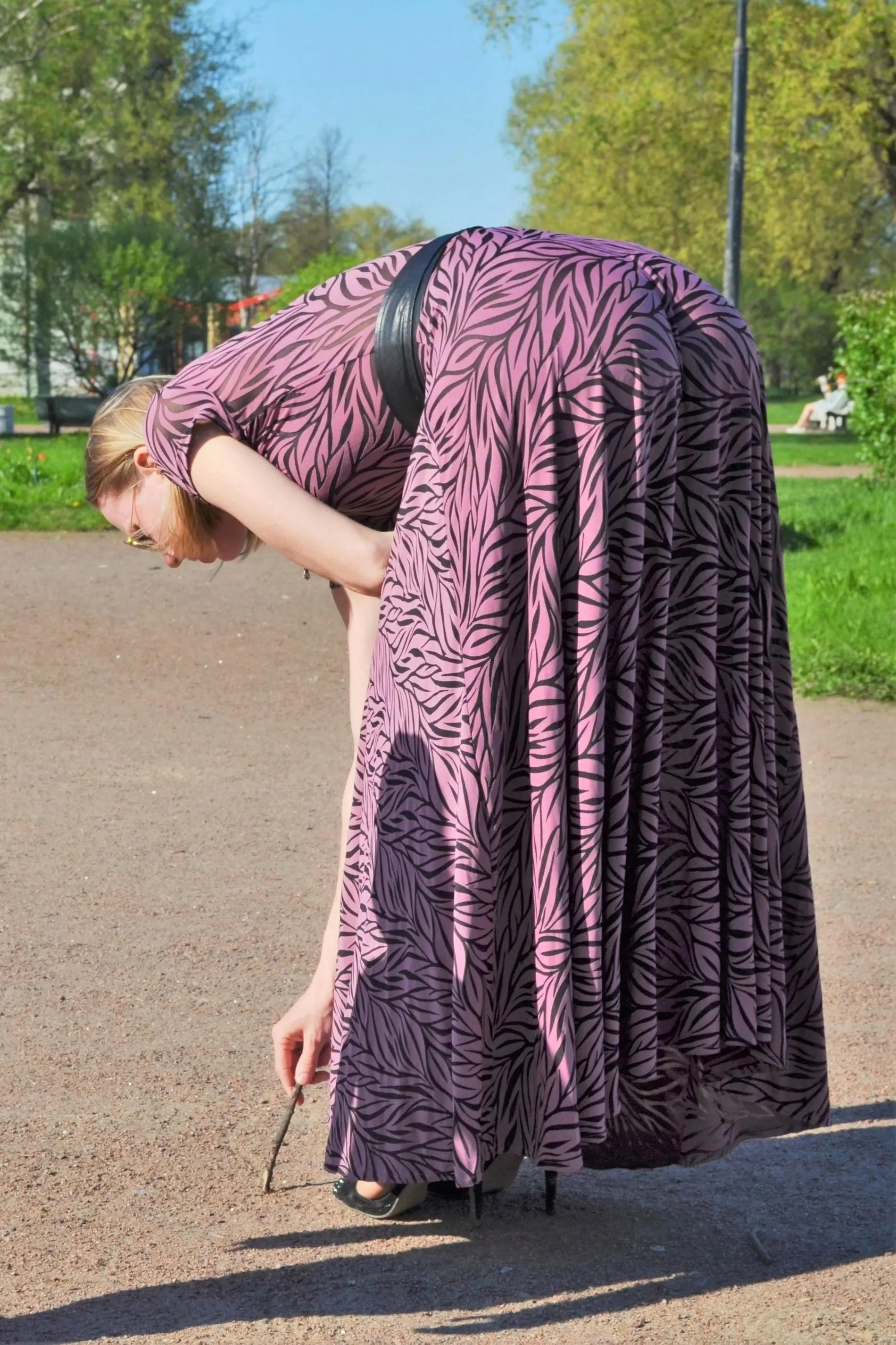 Seductive and Leggy Girl Poses Erotically, Revealing All Her Charms