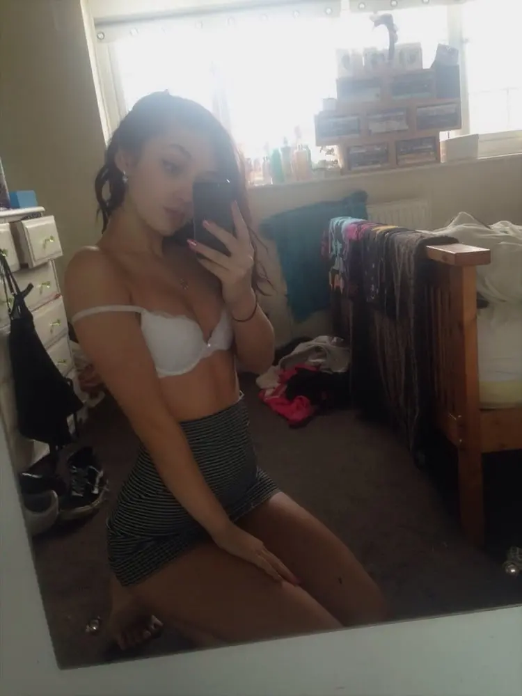 Amateur Photo of Cute Babe with Firm Tits and Shaved Pussy