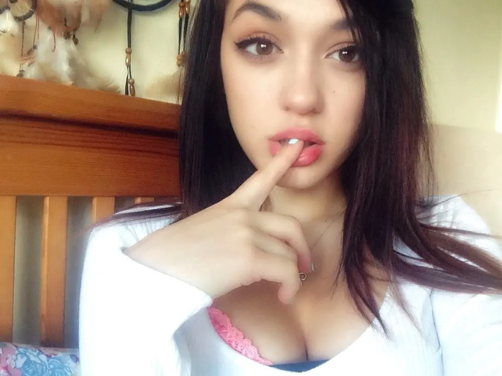 Amateur Photo of Cute Babe with Firm Tits and Shaved Pussy