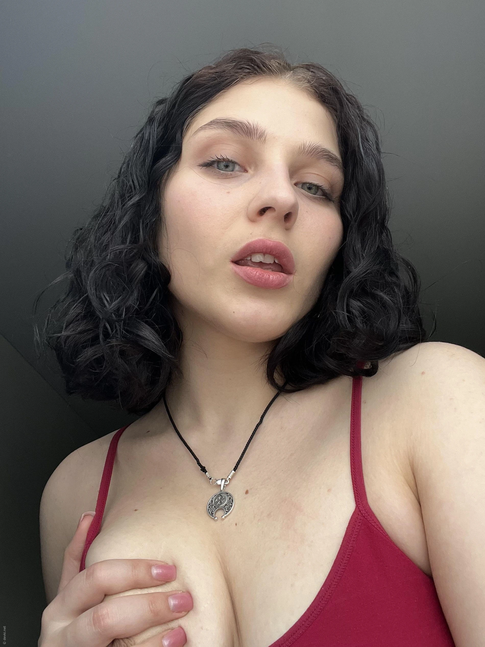 Seductive Mirror and Bed Selfie: Bold Bedroom Pose Exposed