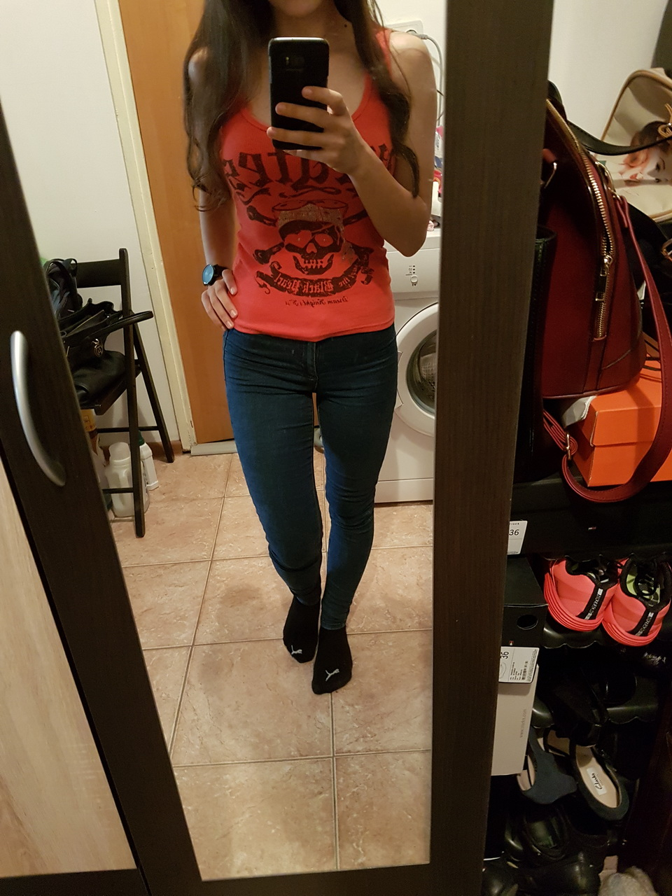 Brunette in tight jeans slowly strips completely naked