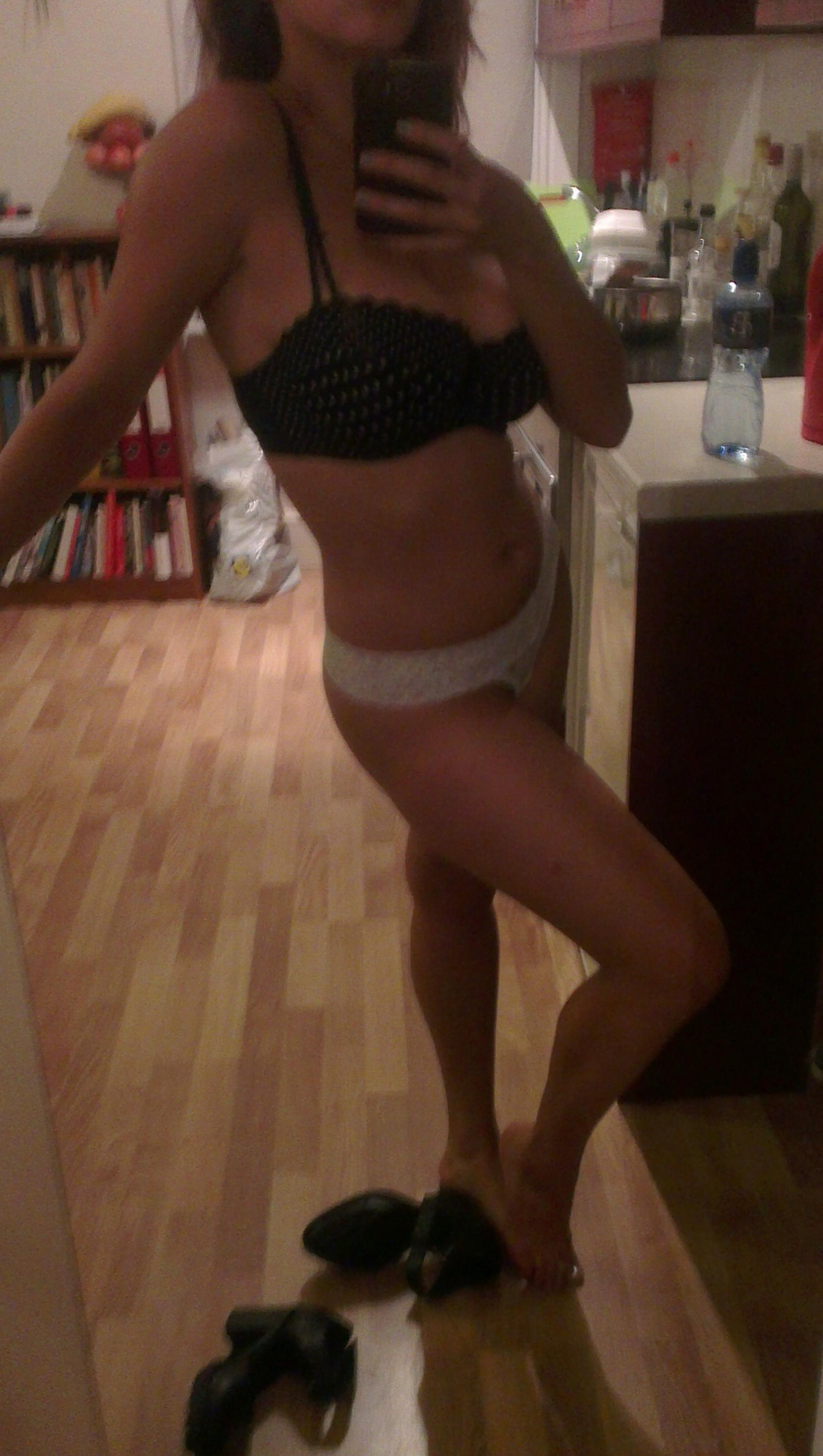Busty babe flaunts naked in front of mirror in various panties