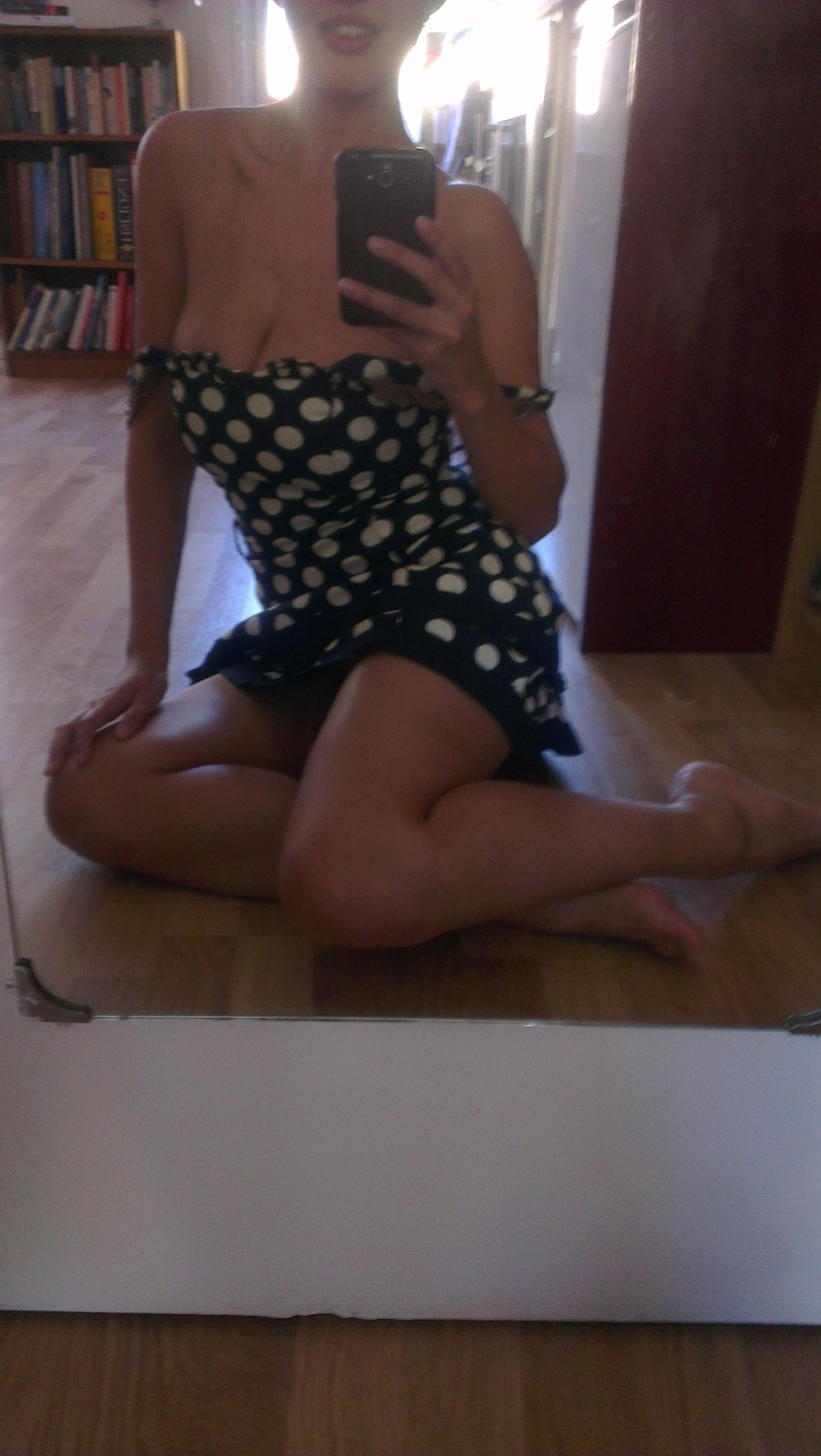 Busty babe flaunts naked in front of mirror in various panties