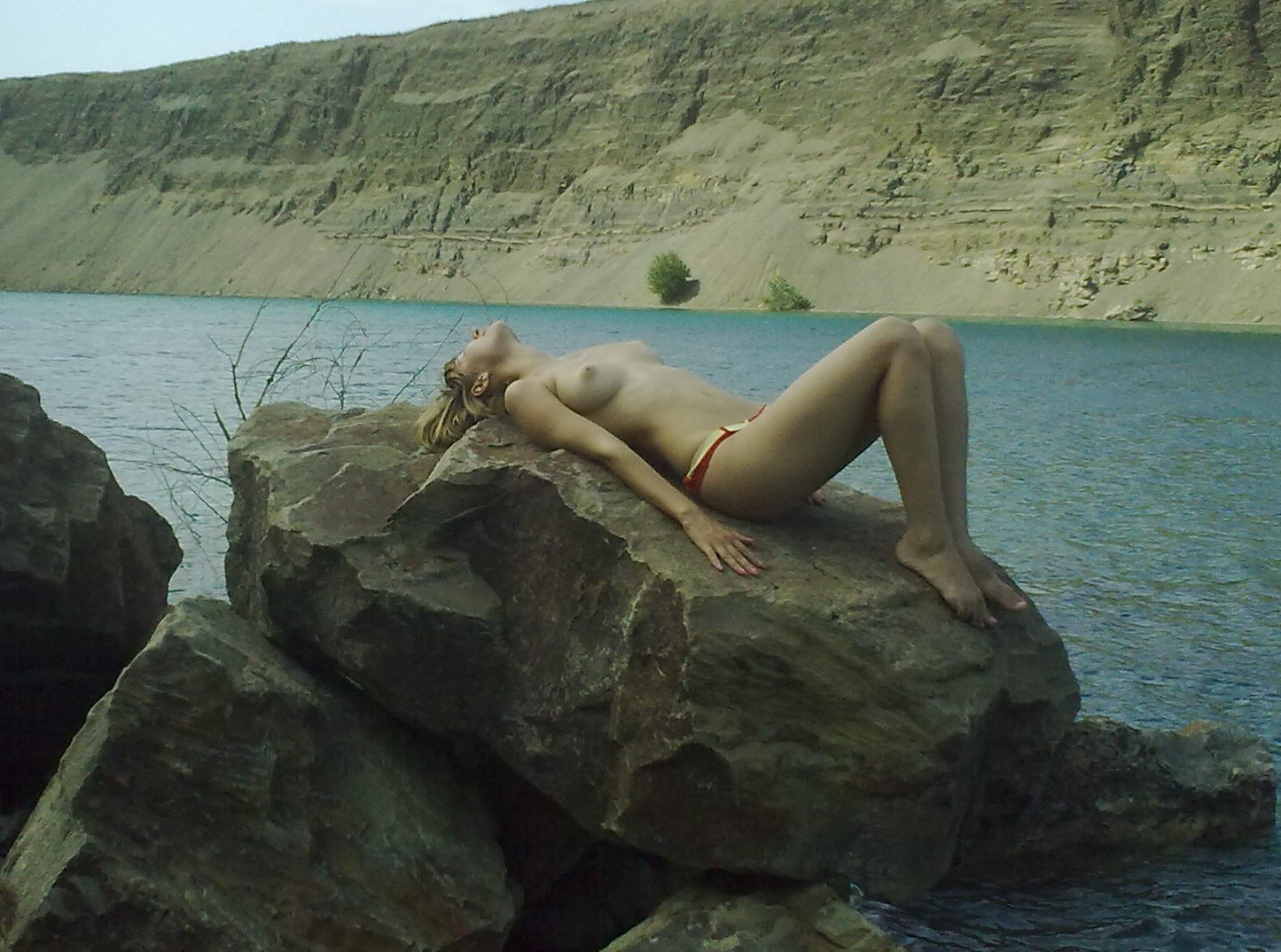 Young Beauty with Stunning Cleavage: Nude Photoshoot Collection