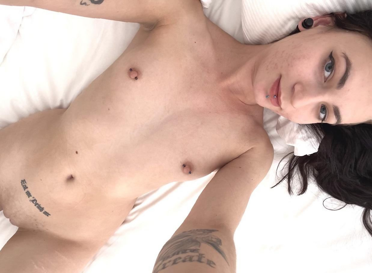 Explicit Intimate Photos of Young Girl with Tattoos and Nipple Piercings