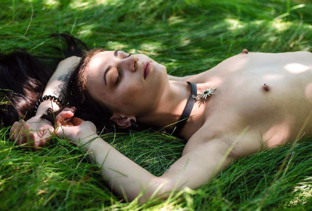 Explicit Intimate Photos of Young Girl with Tattoos and Nipple Piercings