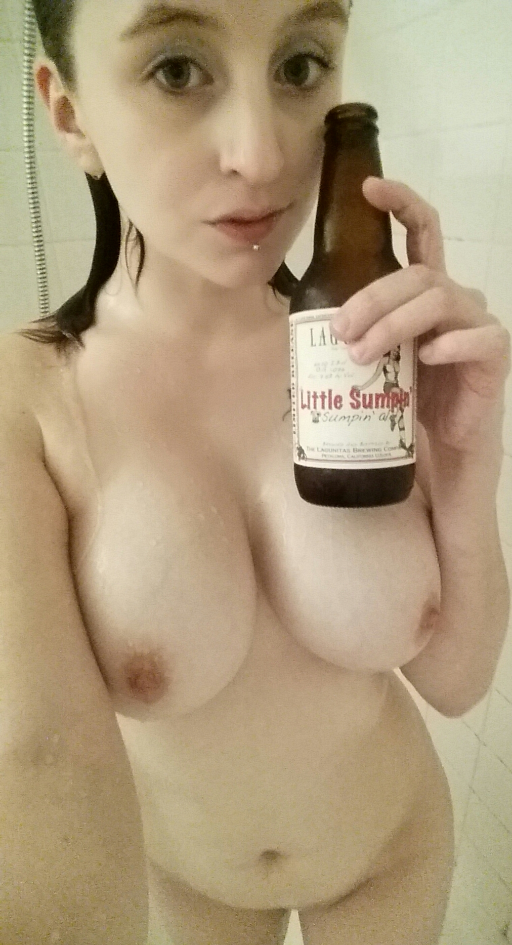 Amateur Photos of Young Woman with Tattoos and Piercings