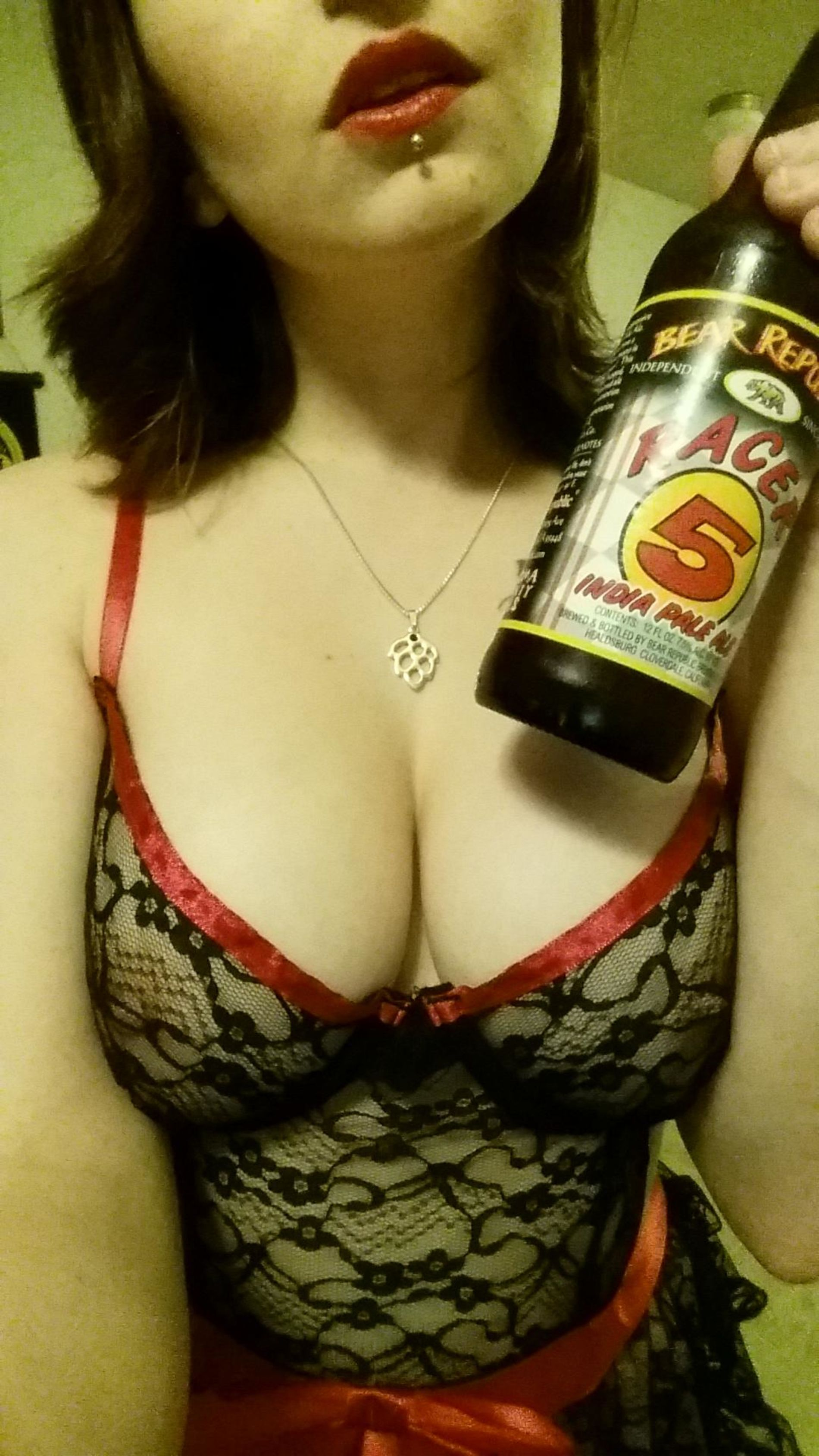 Amateur Photos of Young Woman with Tattoos and Piercings