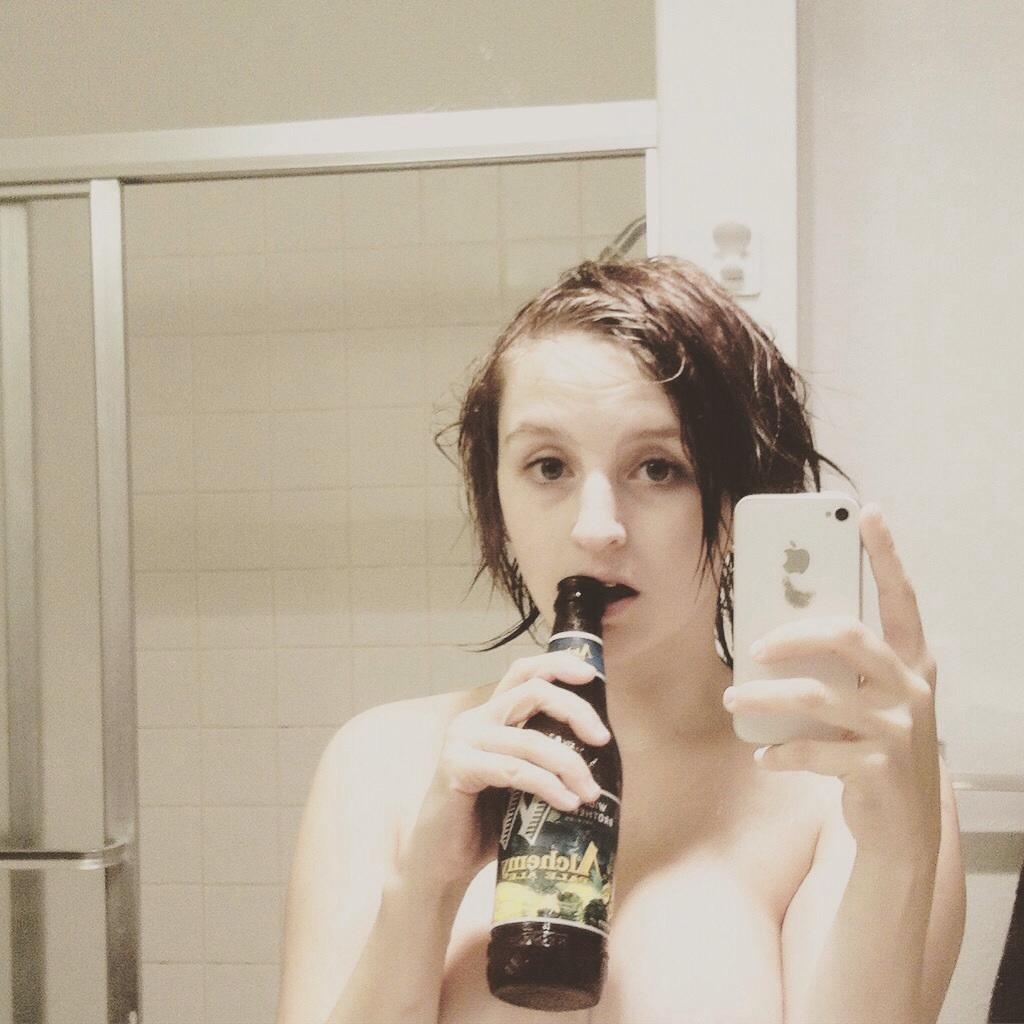 Amateur Photos of Young Woman with Tattoos and Piercings