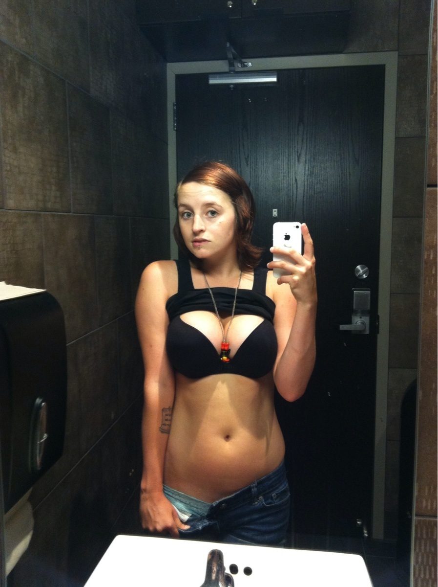 Amateur Photos of Young Woman with Tattoos and Piercings