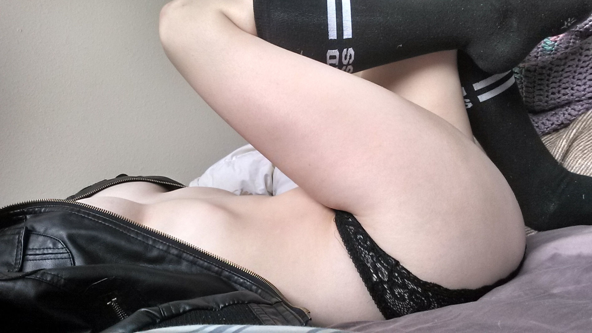 Amateur Photos of Young Woman with Tattoos and Piercings