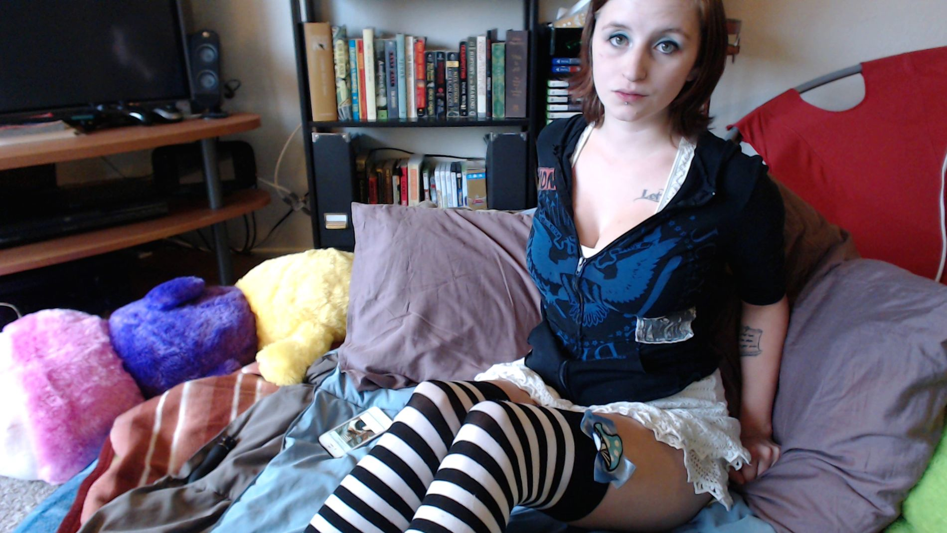 Amateur Photos of Young Woman with Tattoos and Piercings