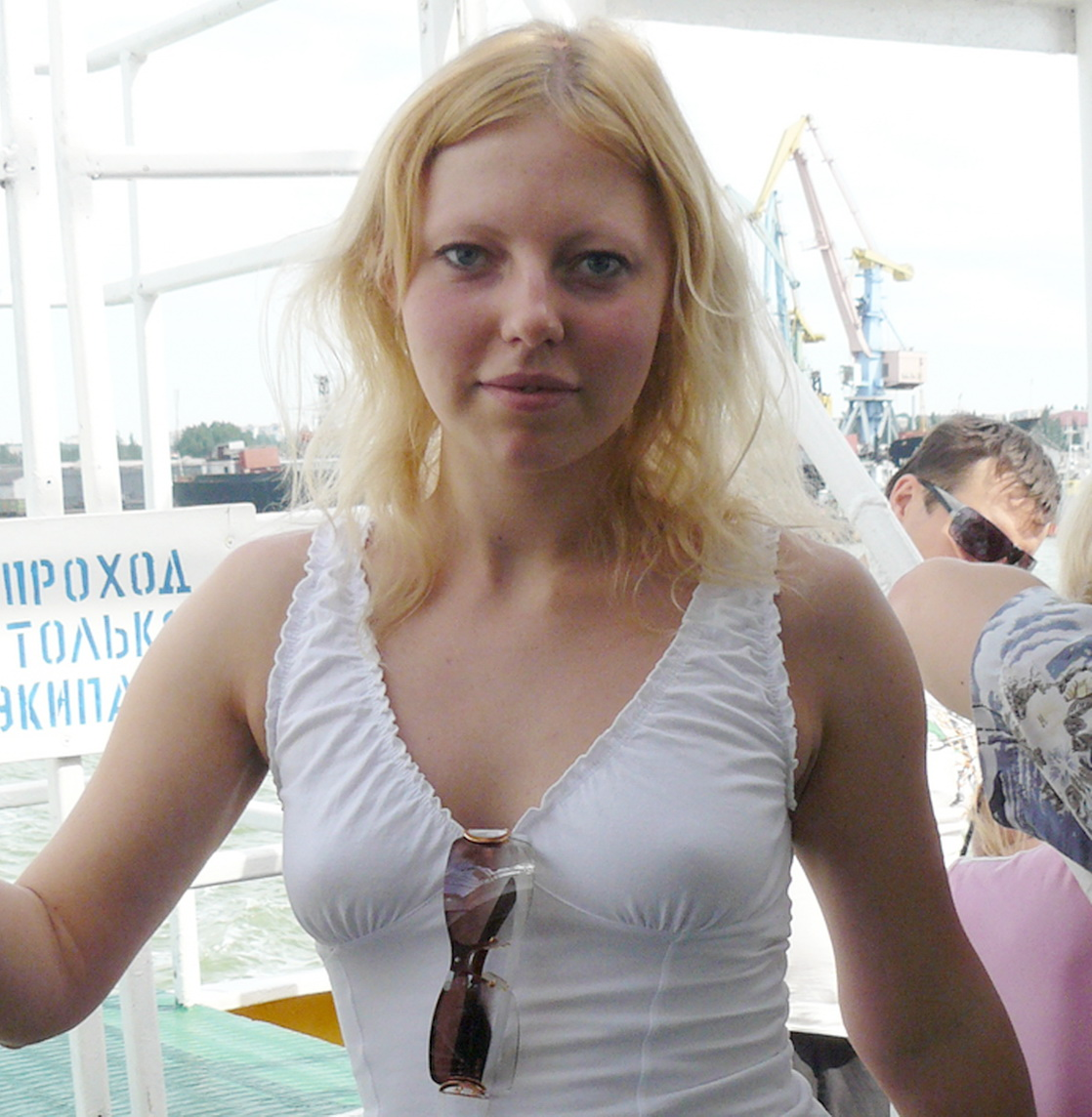 Beautiful young woman with dildo in pussy shows off on hot sex photos