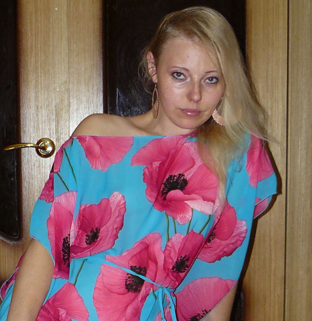 Beautiful young woman with dildo in pussy shows off on hot sex photos