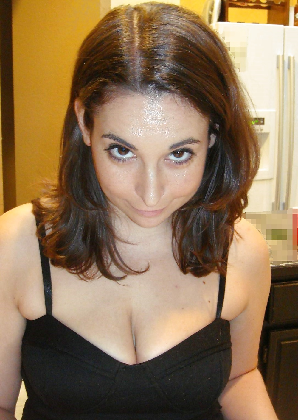 Private photo of woman with naked breasts and cumshot on ass