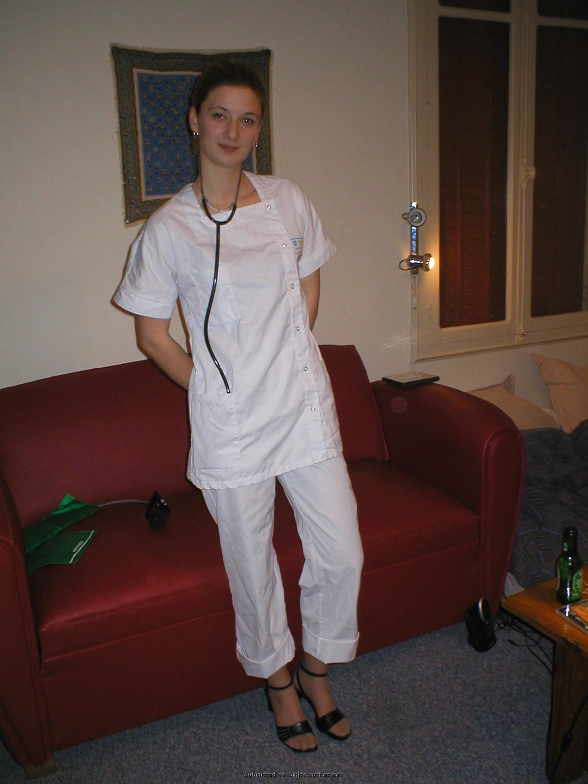 Milf beauty fucks herself with a strapon