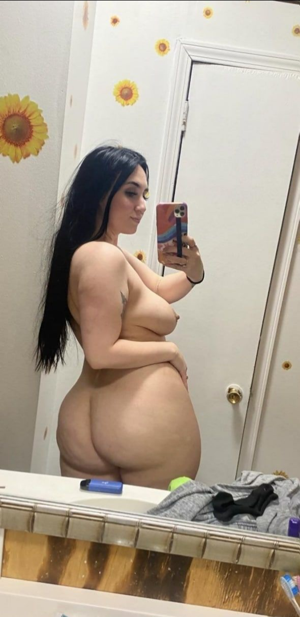 Seductive Brunette Showing Off Her Assets in Selfie – photo 1