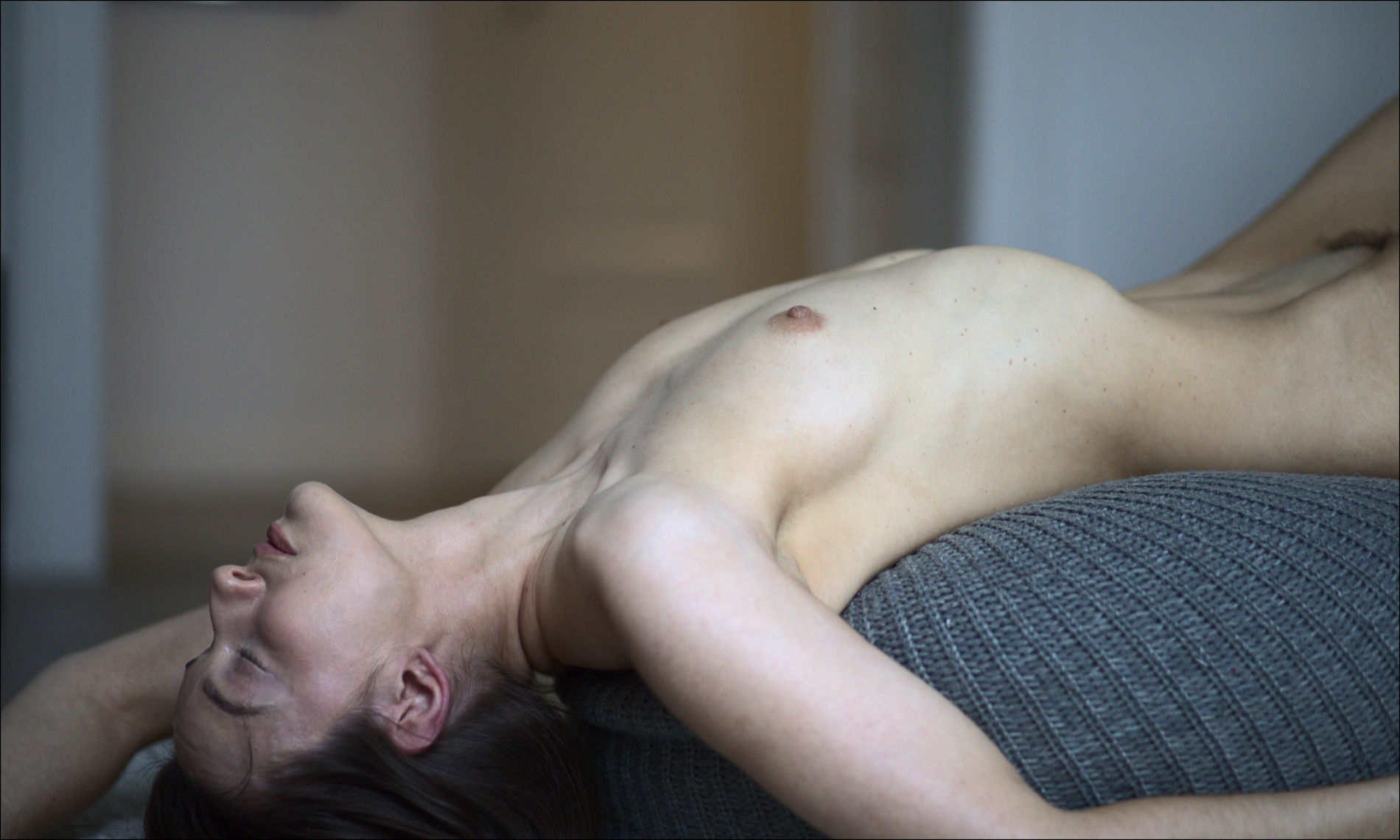 Naked Woman Exuding Uninhibited Energy in Provocative Photo