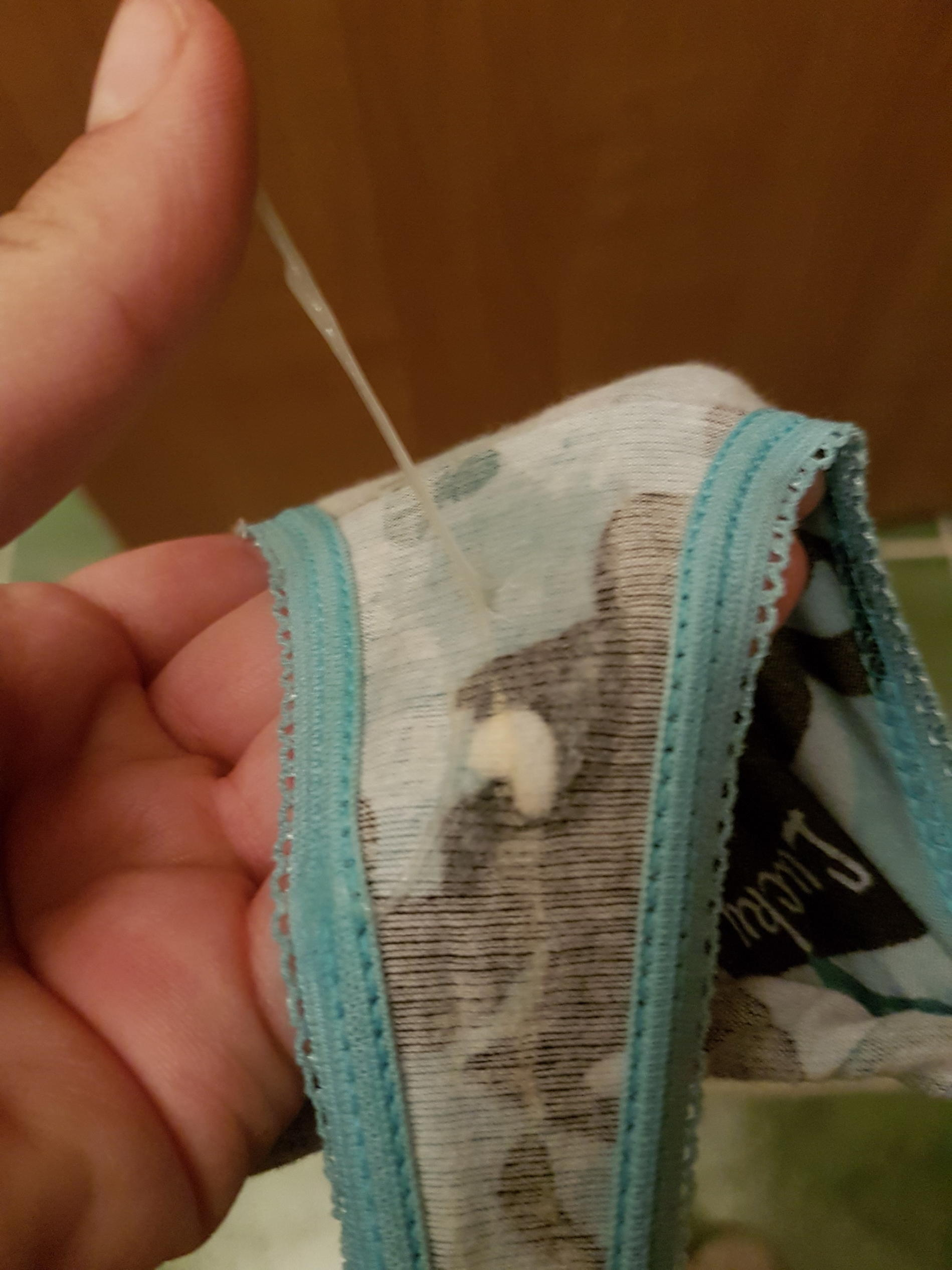 Spying in the mirror, I took off my shorts and showed off my wet panties and aroused pussy