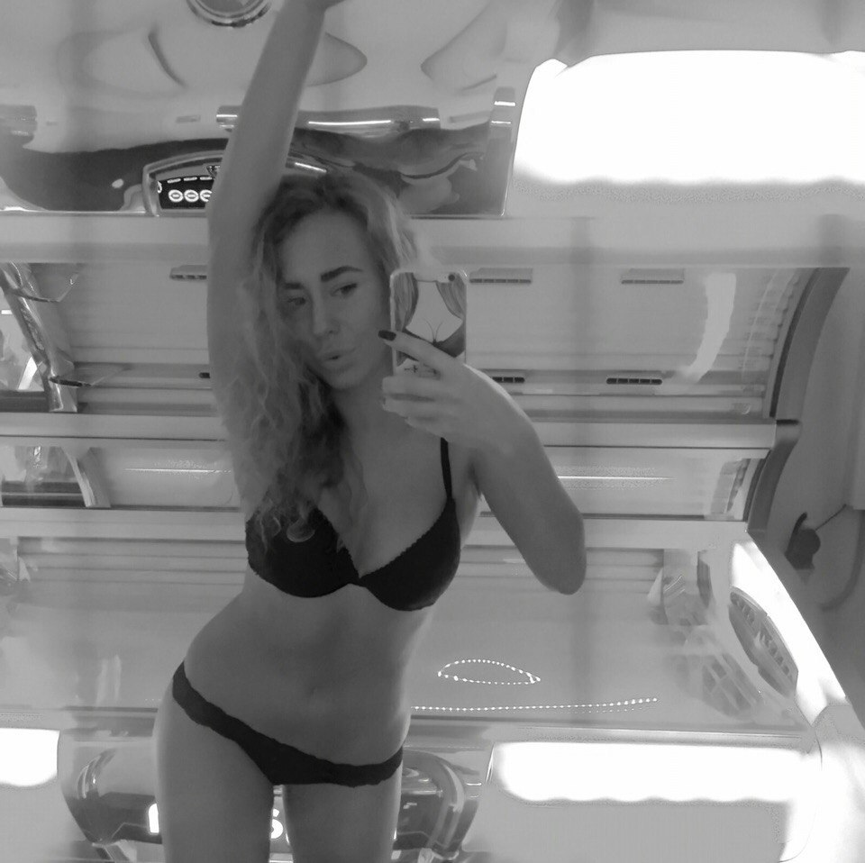 Slim lady enjoying nude posing for explicit photoshoot