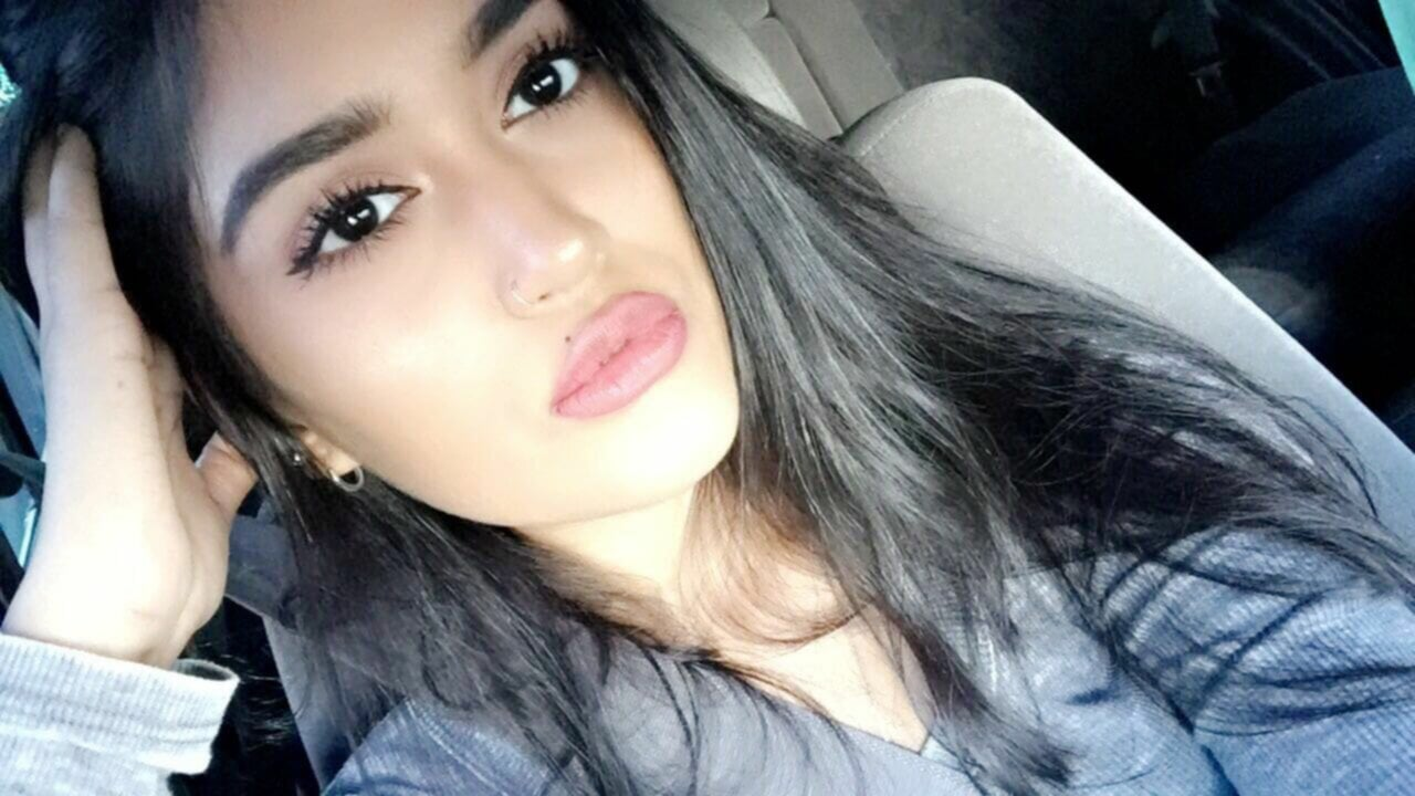 Sexy Eastern Brunette Showing Off Attractive Curves