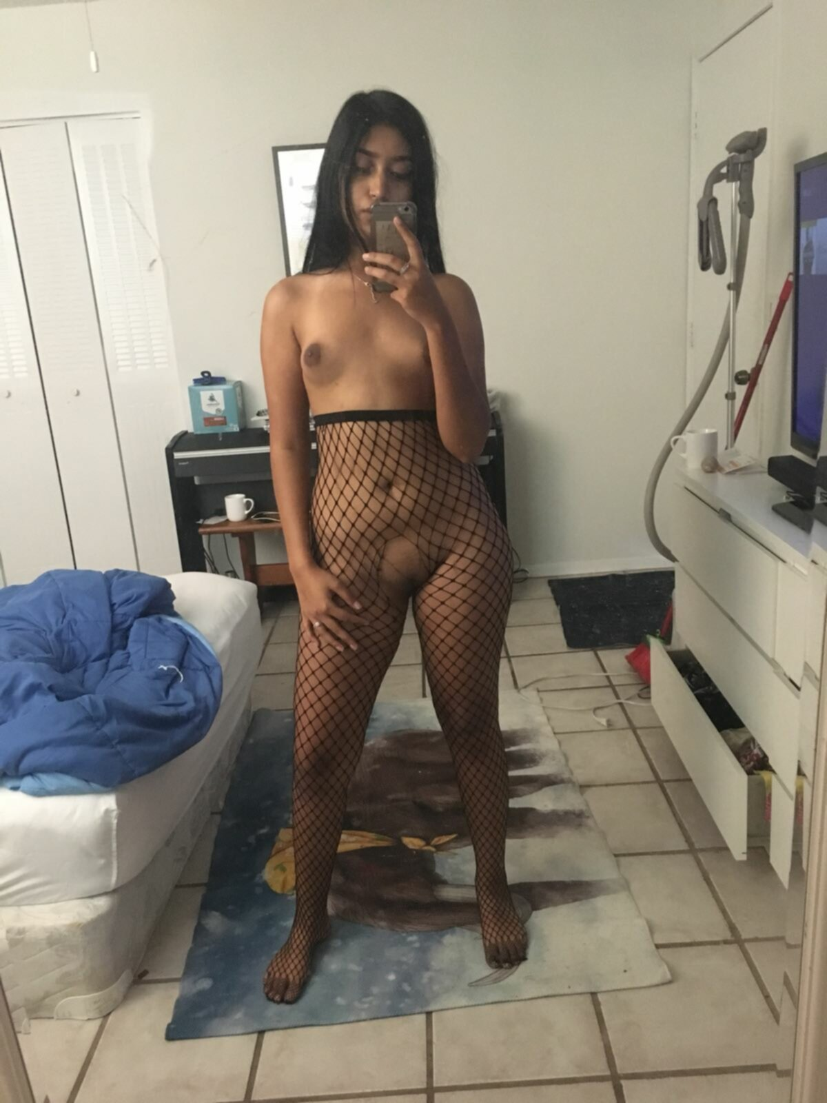 Sexy Eastern Brunette Showing Off Attractive Curves