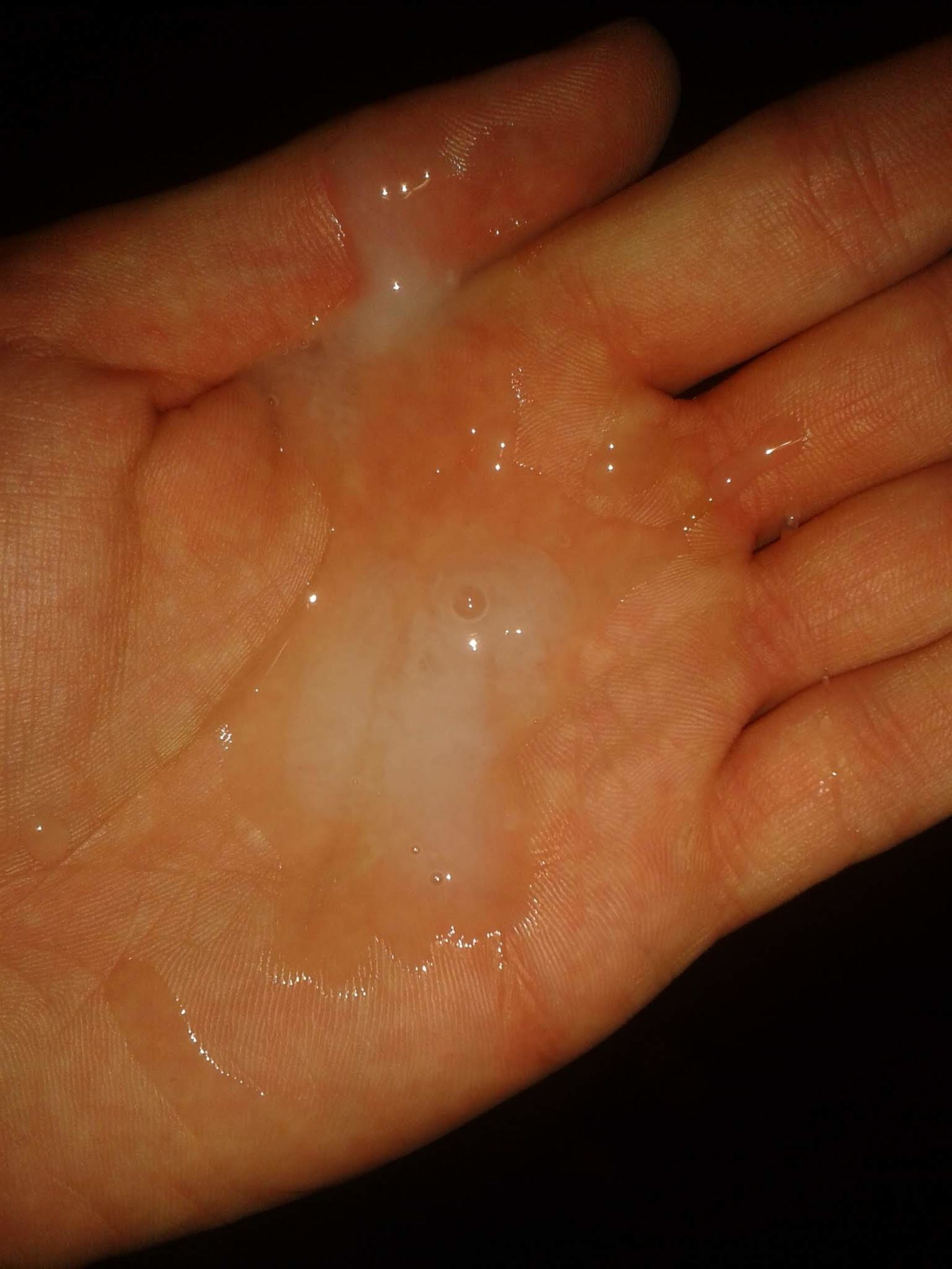 Attractive MILF strokes cock and gets covered in cum