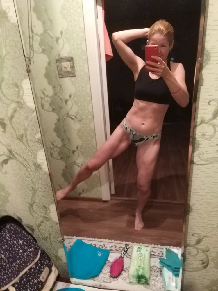 Naked Fitness Model Poses Explicitly for Photoshoot