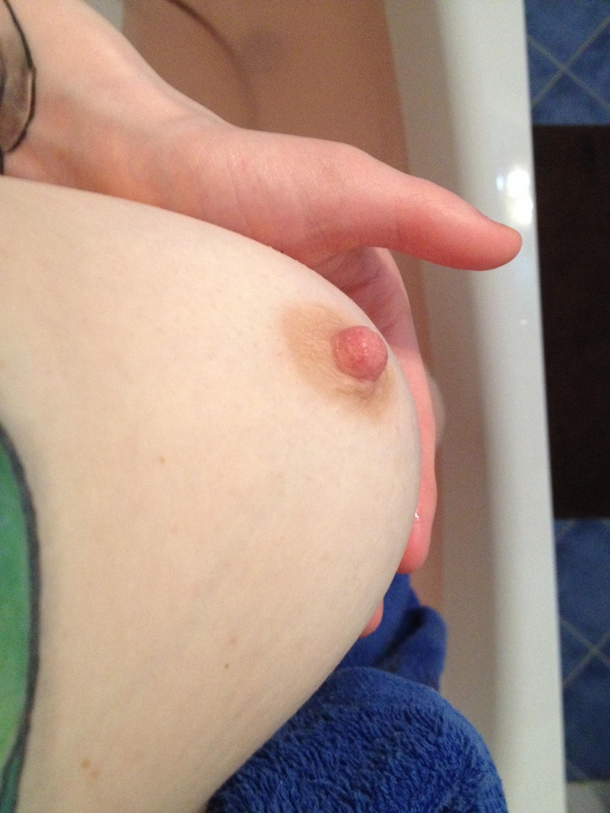 Redhead with Stunning Boobs Poses Nude