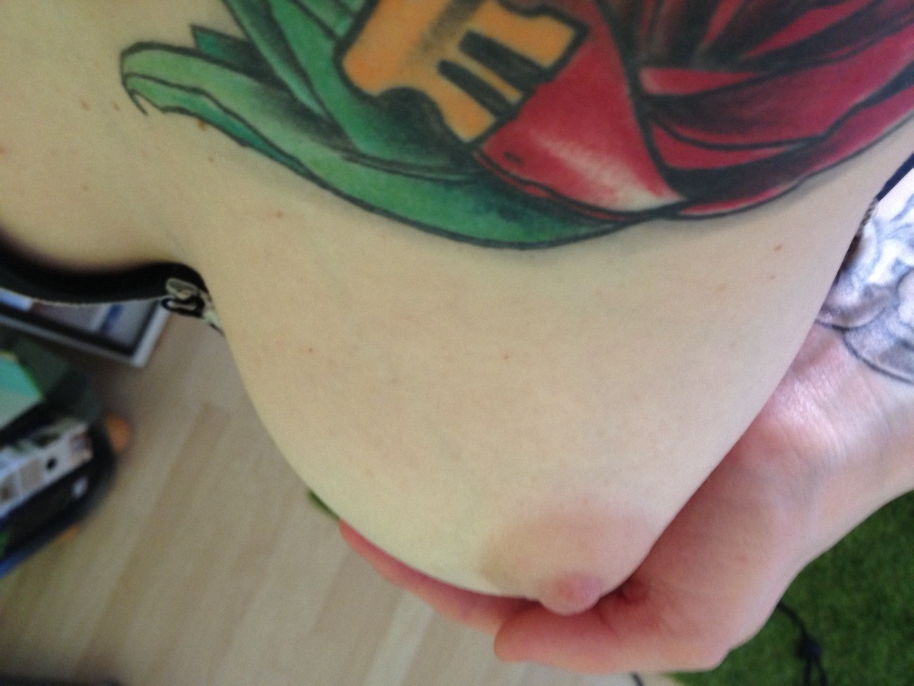 Redhead with Stunning Boobs Poses Nude